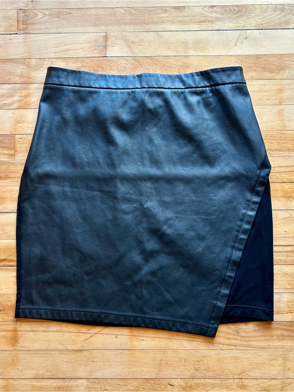 Universal Standard asymmetrical faux leather/jersey black skirt